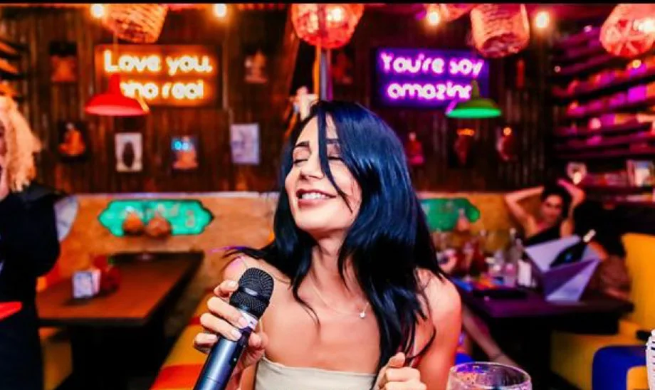 Neon-lit private karaoke session at Mr. Miyagi's Dubai